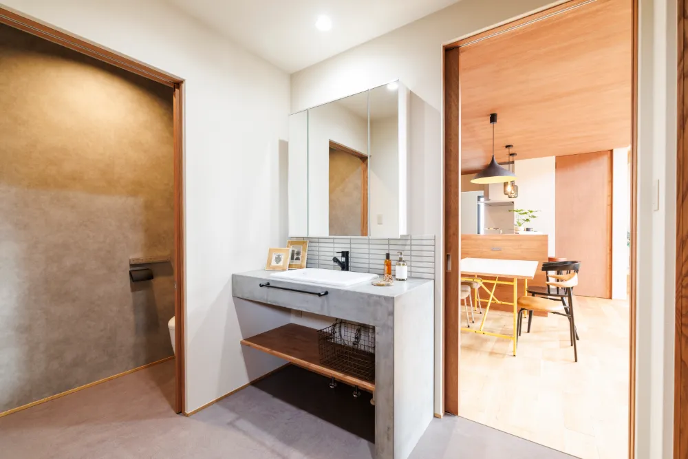 トレーニングルームと大容量収納のある、心と身体と物が整う家